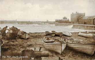 salmon boats on beach